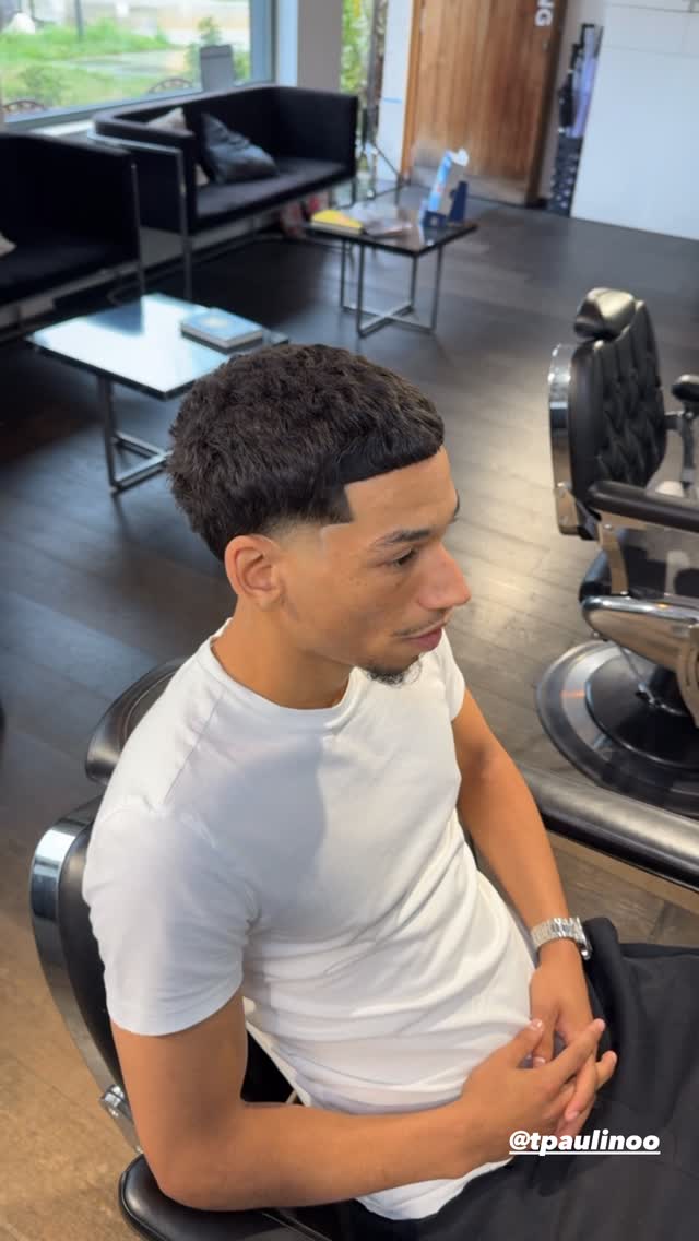 Textured crop with a precise fade by Rish Hair Artist